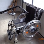 Anhängen des Rollstuhls am Liftarm